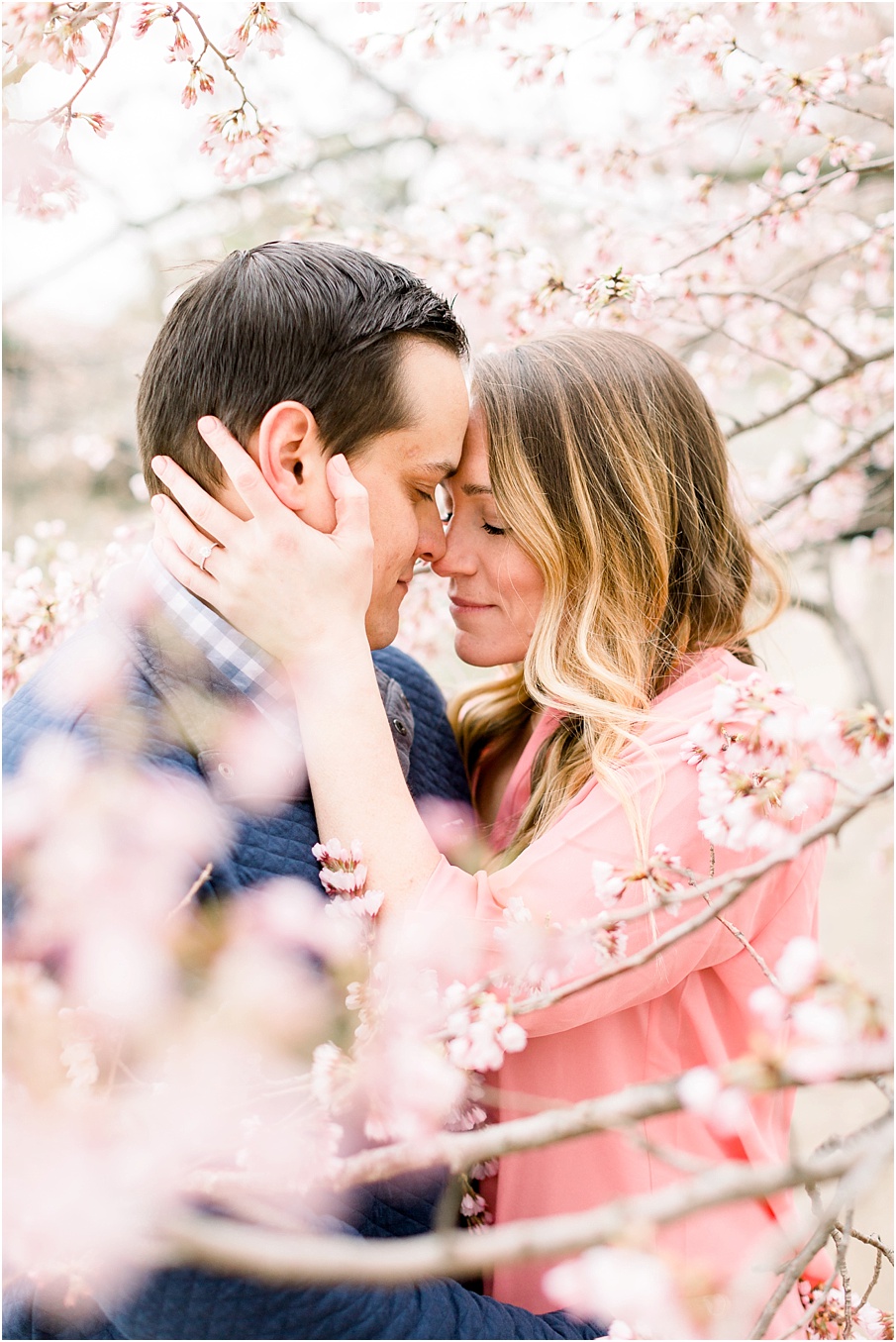 Cherry Blossom engagement sessions are popular in Washington DC during the peak season. This tidal basin cherry blossom session was held at sunrise and blooms were every where.